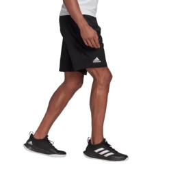 Adidas Men's Club Stretch Woven 9-Inch Shorts (Black/White) -Ball Games Shop GL5409 APP on model walking white